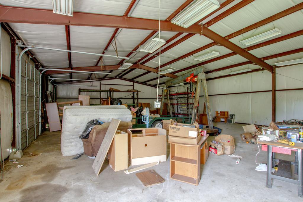 4314 Kinneys Road Springfield, TN 37172 - Photo 27 of 28 a view of a storage room with racks