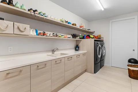 a bedroom with a bed and a curtain