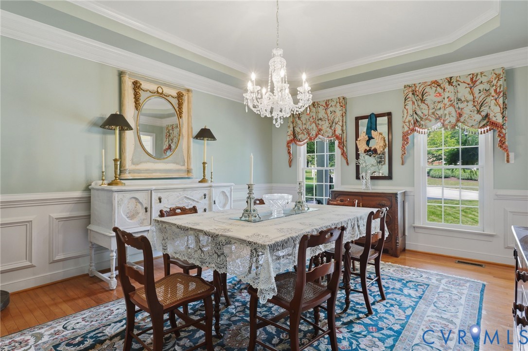 13424 Tipple Point Road Midlothian, VA 23114 - Photo 6 of 53 a view of a a dining room with furniture window and wooden floor