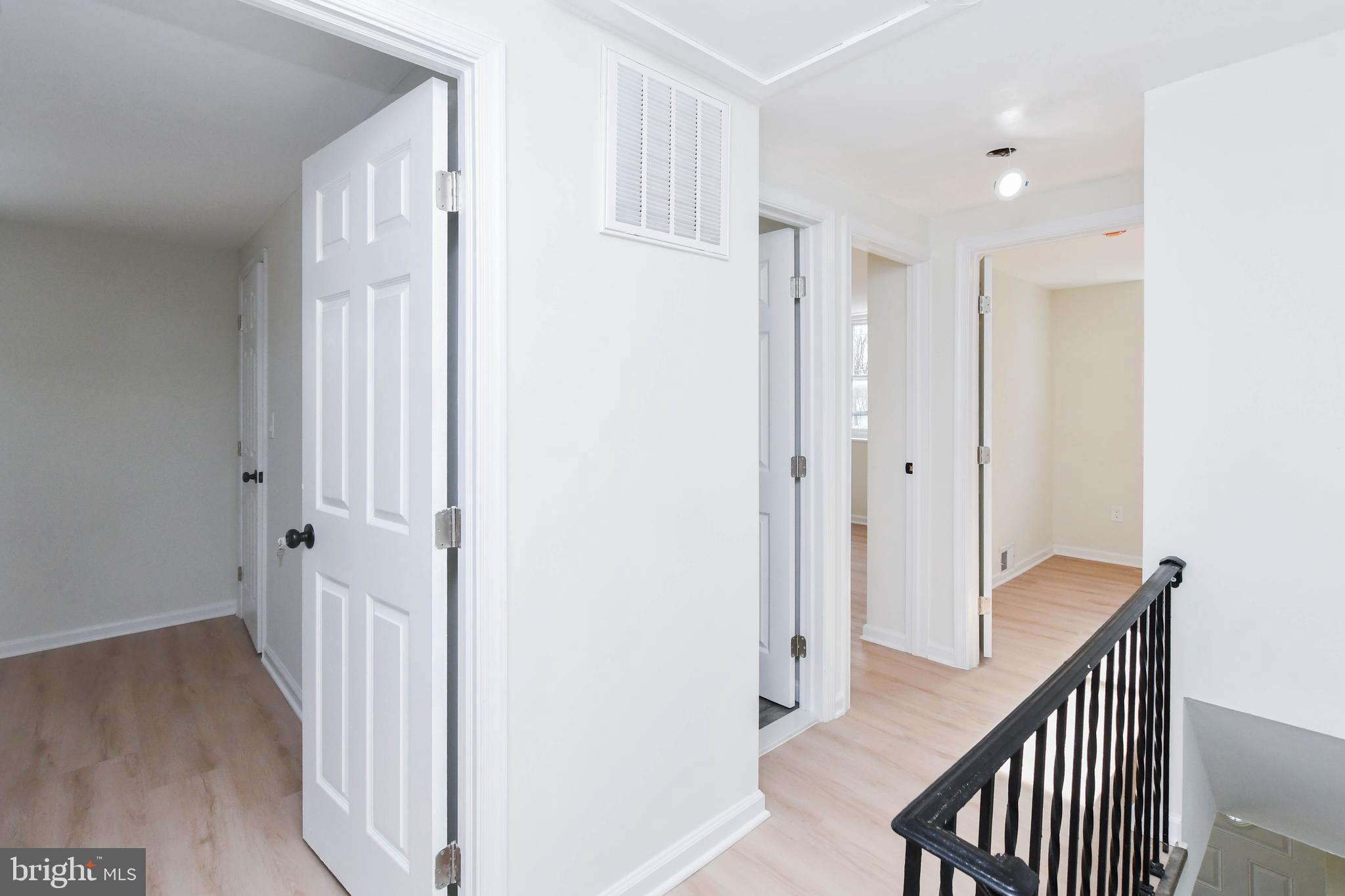 8130 Sheriff Road Landover, MD 20785 - Photo 18 of 36 a view of a hallway with wooden floor and entryway