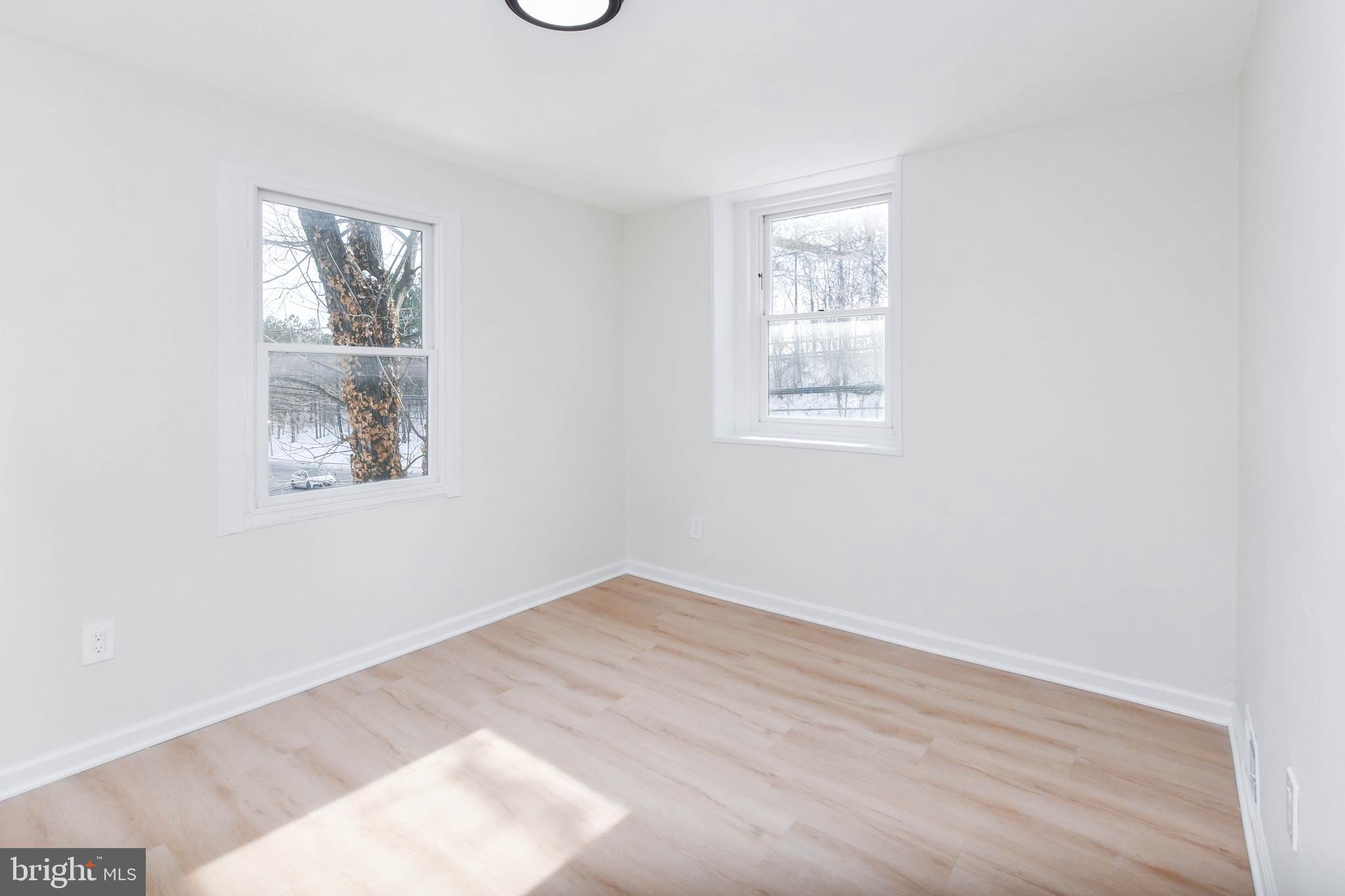 8130 Sheriff Road Landover, MD 20785 - Photo 25 of 36 an empty room with windows
