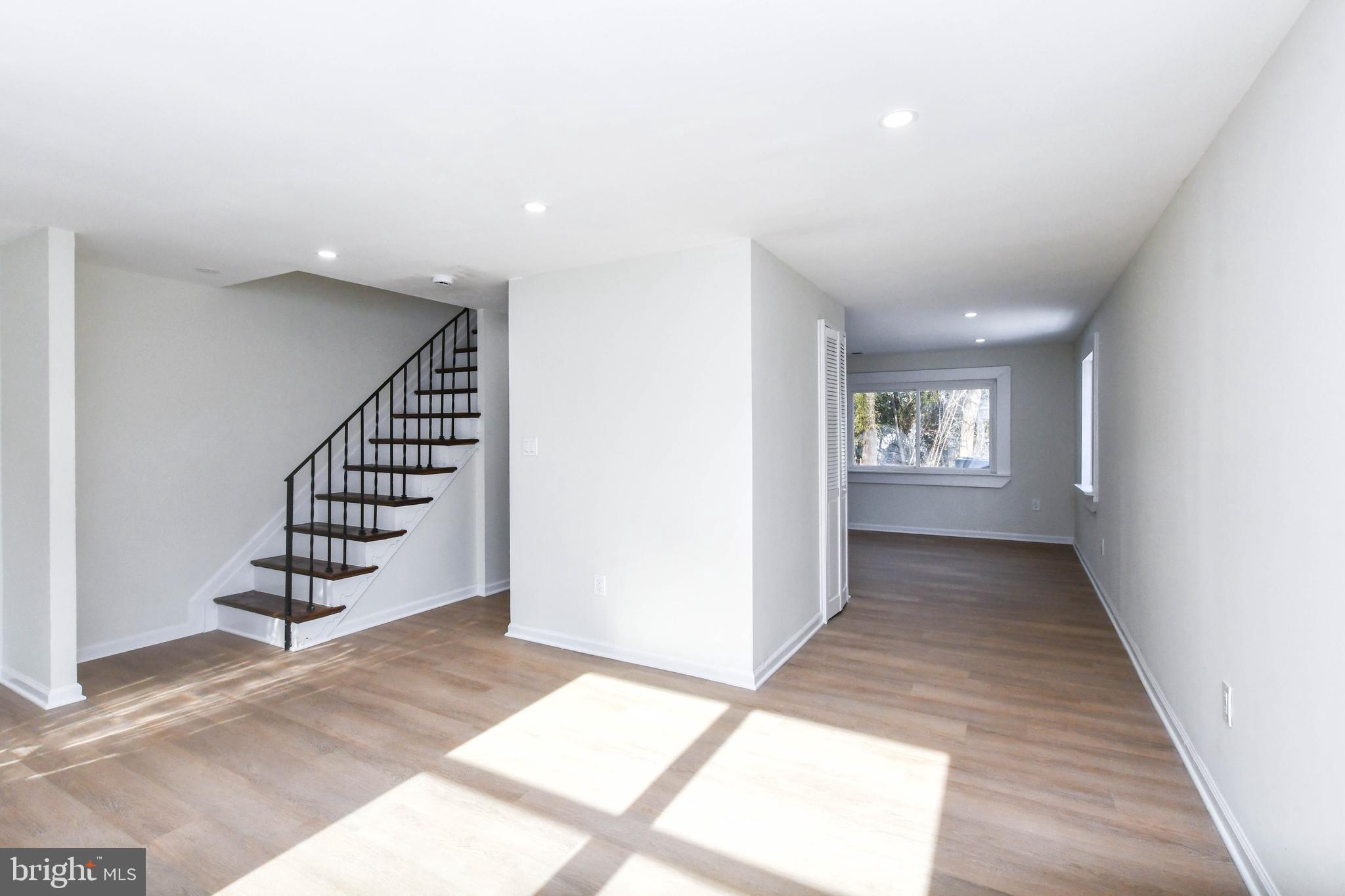 8130 Sheriff Road Landover, MD 20785 - Photo 6 of 36 a view of entryway with stairs and wooden floor