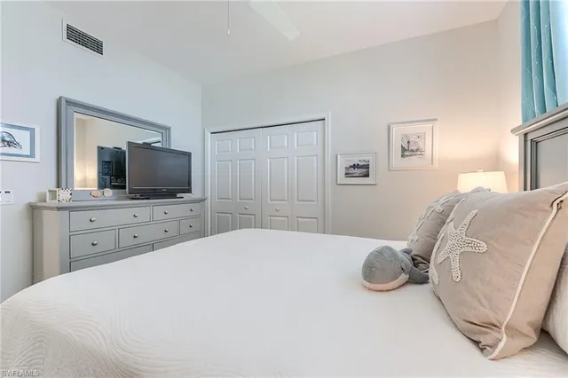 an aerial view of residential house with an outdoor space and seating