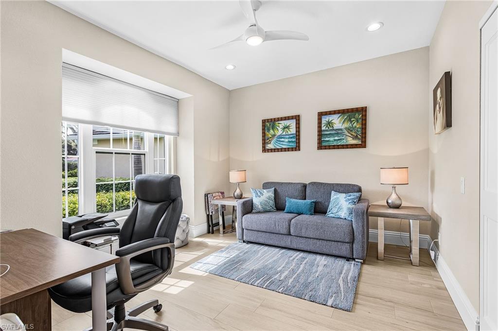 1799 Langford Lane Naples, FL 34109 - Photo 11 of 25 a living room with furniture and a window