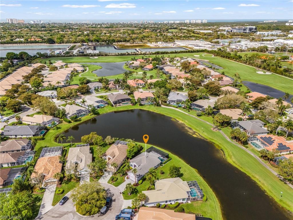 1799 Langford Lane Naples, FL 34109 - Photo 18 of 25 an aerial view of lake residential houses with outdoor space