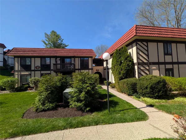 a front view of house with a yard