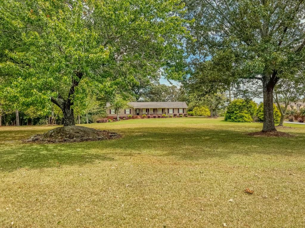 1152 Harbins Road Dacula, GA 30019 - Photo 3 of 33