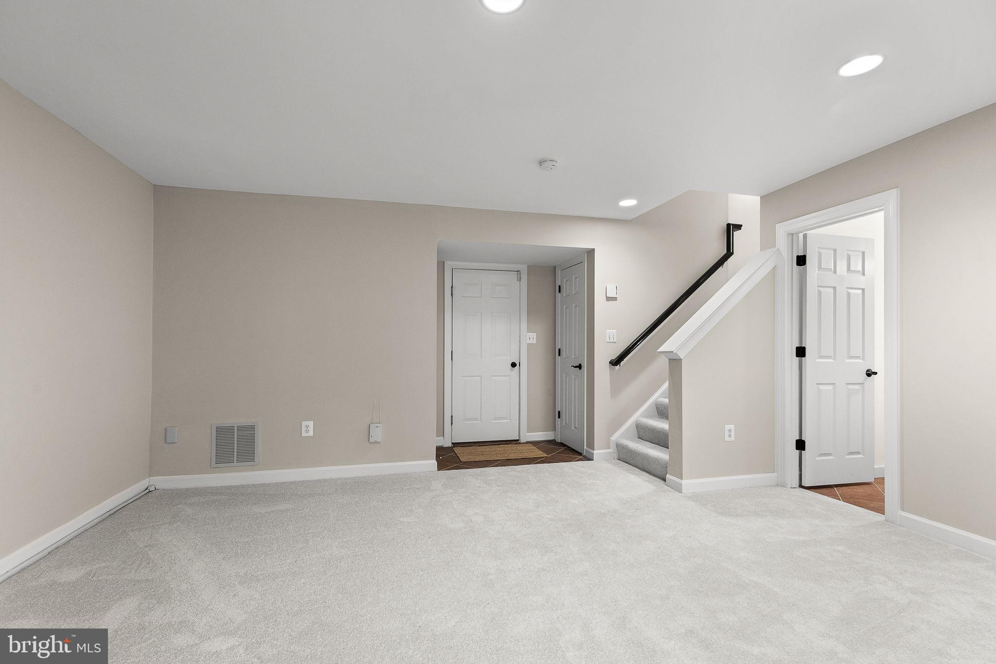15686 Avocet Loop Woodbridge, VA 22191 - Photo 26 of 33 a view of an empty room with stairs
