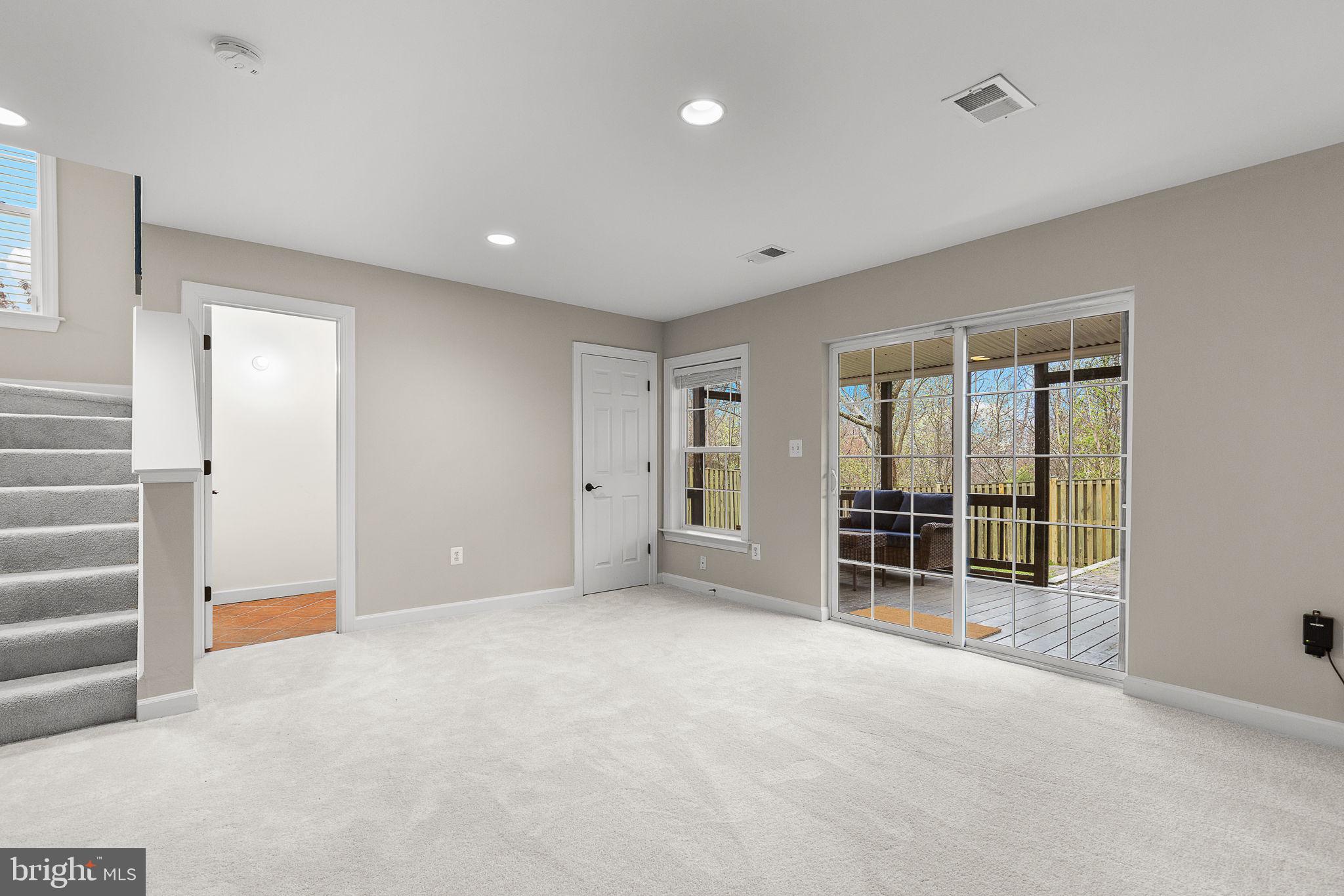 15686 Avocet Loop Woodbridge, VA 22191 - Photo 27 of 33 an empty room with entrance and door