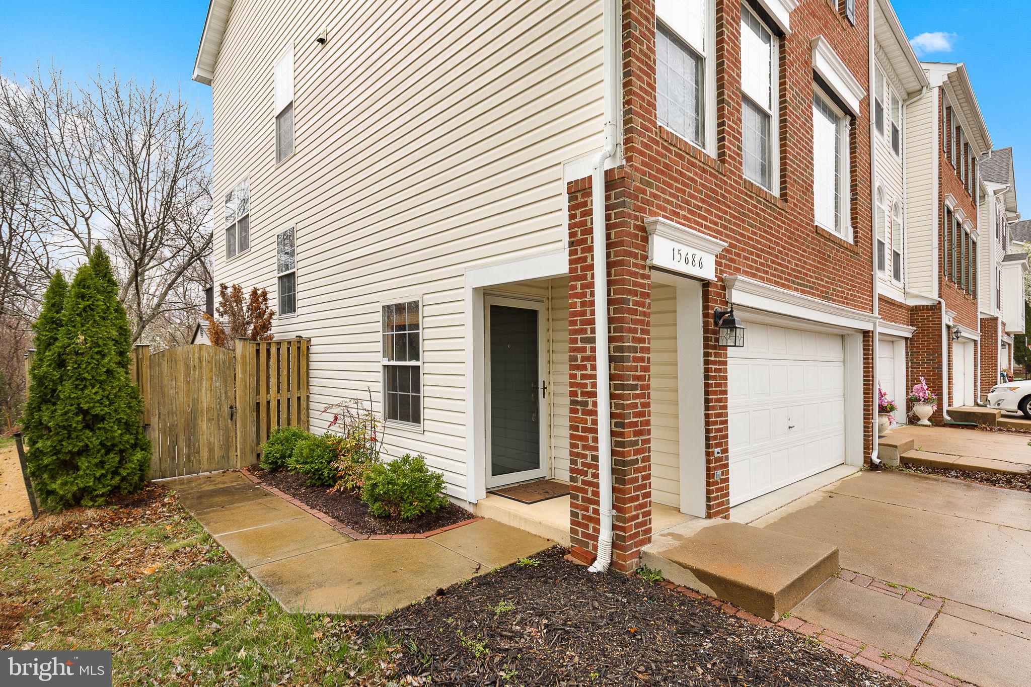 15686 Avocet Loop Woodbridge, VA 22191 - Photo 33 of 33 a view of a house with a yard