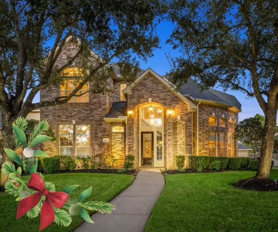 a view of yard with tree and outdoor seating