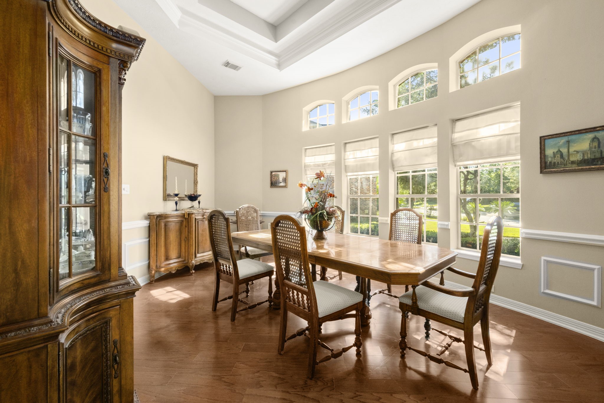 19902 Tidy Tips Lane Spring, TX 77379 - Photo 11 of 50 a view of a dining room with furniture window and wooden floor