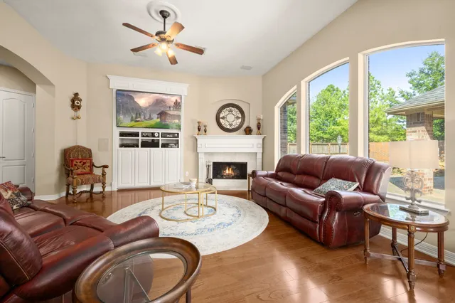 a kitchen with stainless steel appliances kitchen island granite countertop a refrigerator and a sink