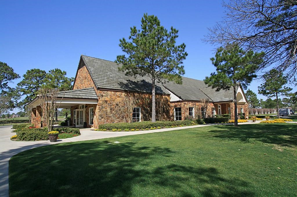 19902 Tidy Tips Lane Spring, TX 77379 - Photo 40 of 50 a front view of a house with a yard