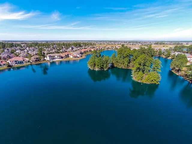 a view of a park with swings and slides