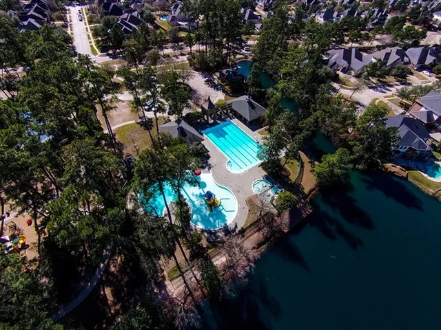 a view of a lake with outdoor space and sitting area