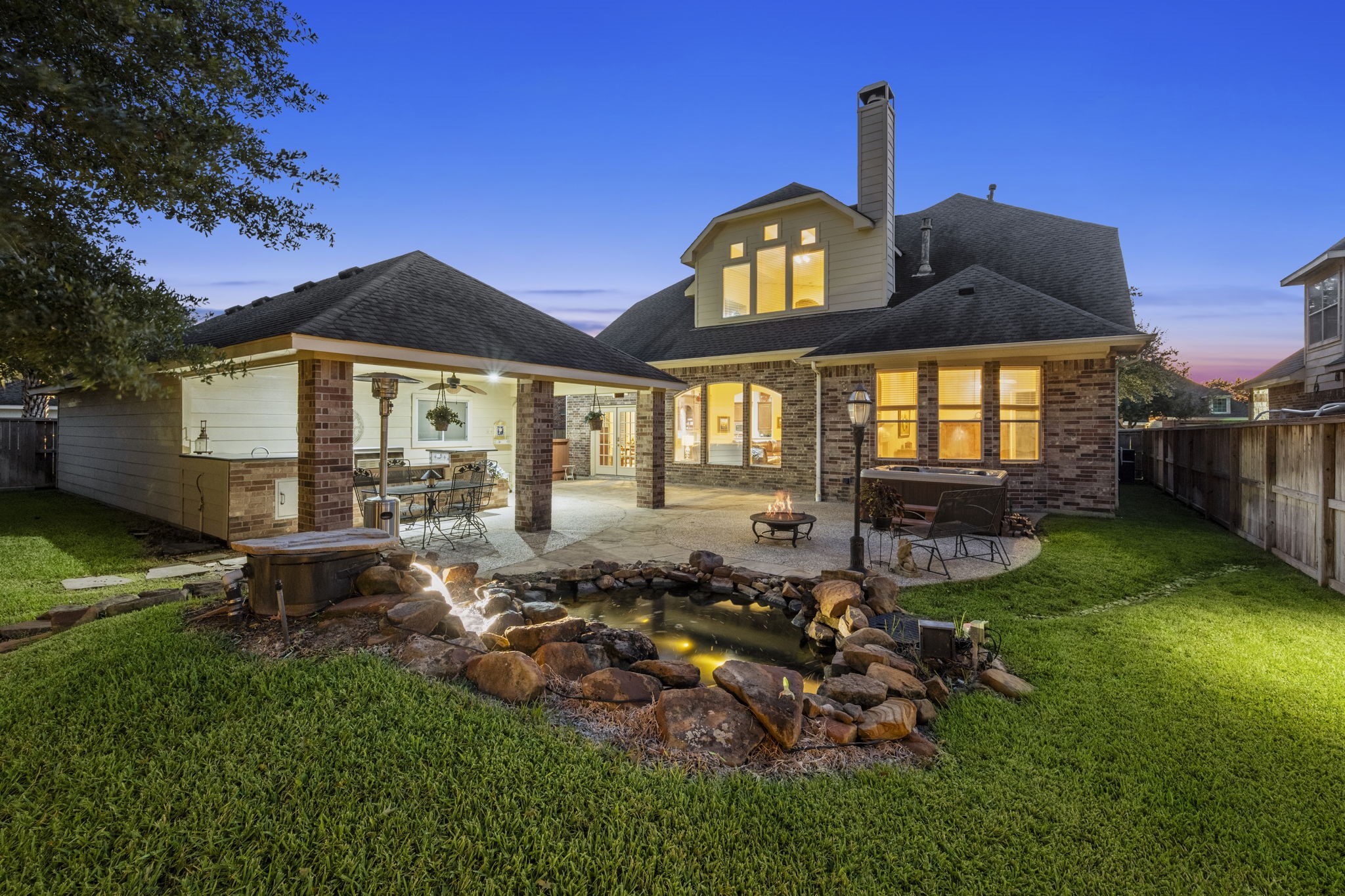 19902 Tidy Tips Lane Spring, TX 77379 - Photo 7 of 50 a front view of a house with a garden