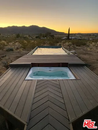 a view of outdoor space with swimming pool