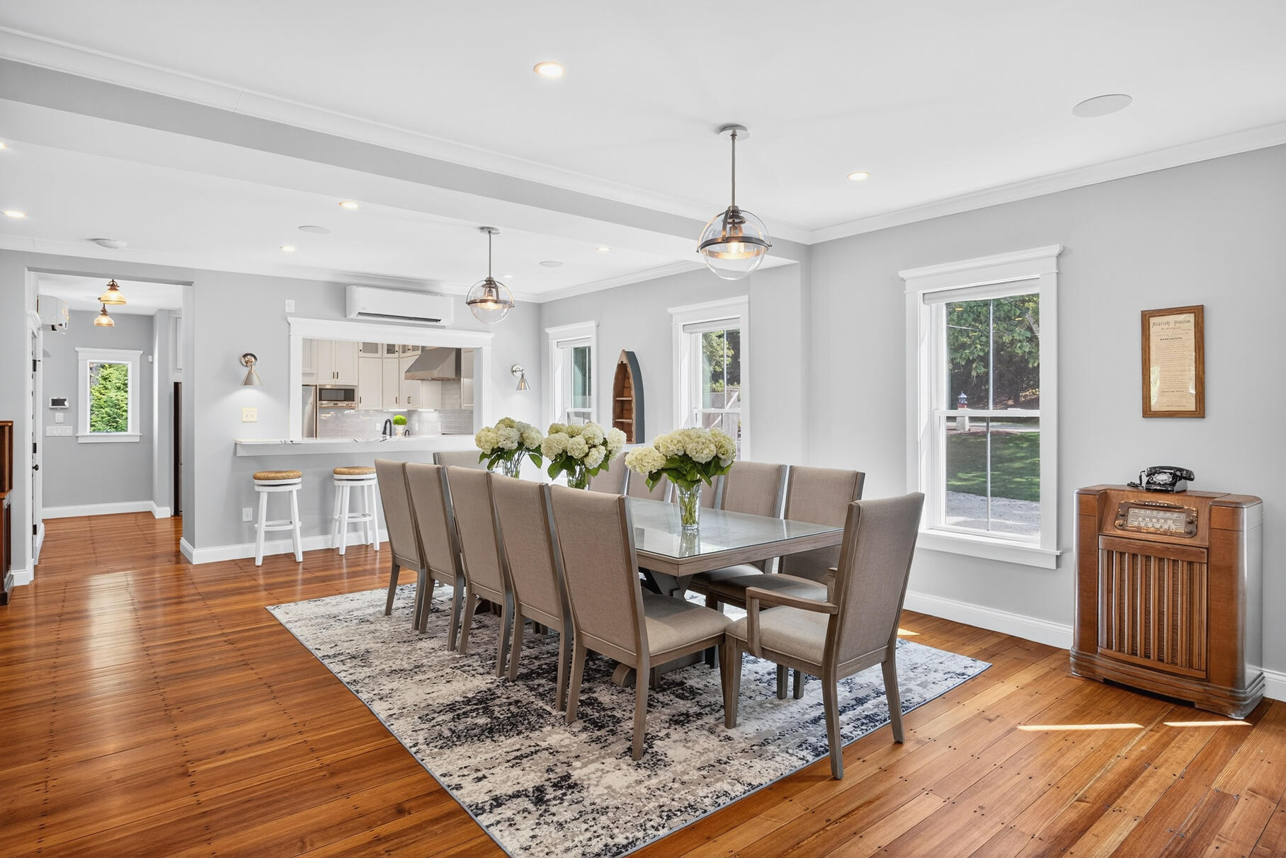 48 Red Brook Harbor Road Pocasset, MA 02559 - Photo 11 of 59 a view of a dining room with furniture window and wooden floor