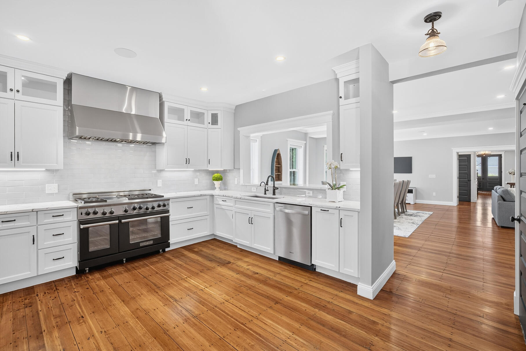 48 Red Brook Harbor Road Pocasset, MA 02559 - Photo 12 of 59 a kitchen with stainless steel appliances and white cabinets