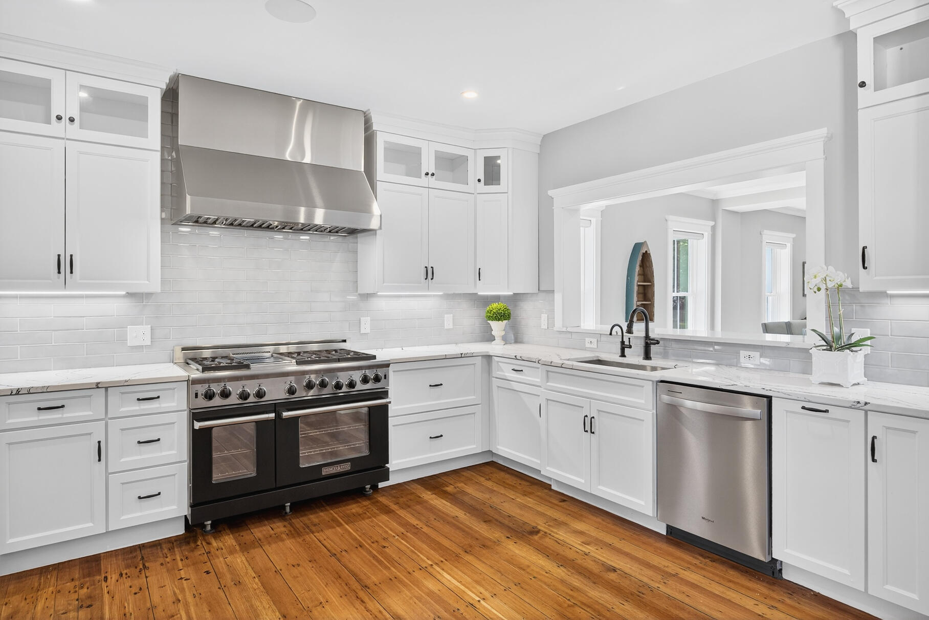 48 Red Brook Harbor Road Pocasset, MA 02559 - Photo 13 of 59 a kitchen with stainless steel appliances granite countertop a stove and white cabinets