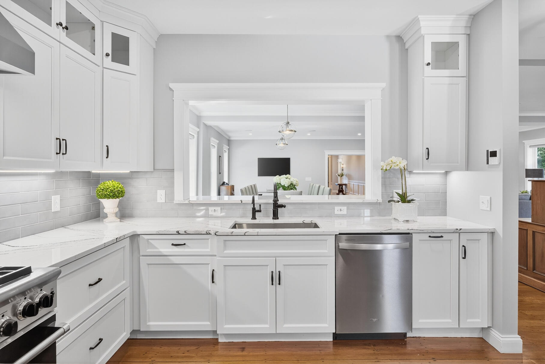 48 Red Brook Harbor Road Pocasset, MA 02559 - Photo 14 of 59 a kitchen with white cabinets and white appliances