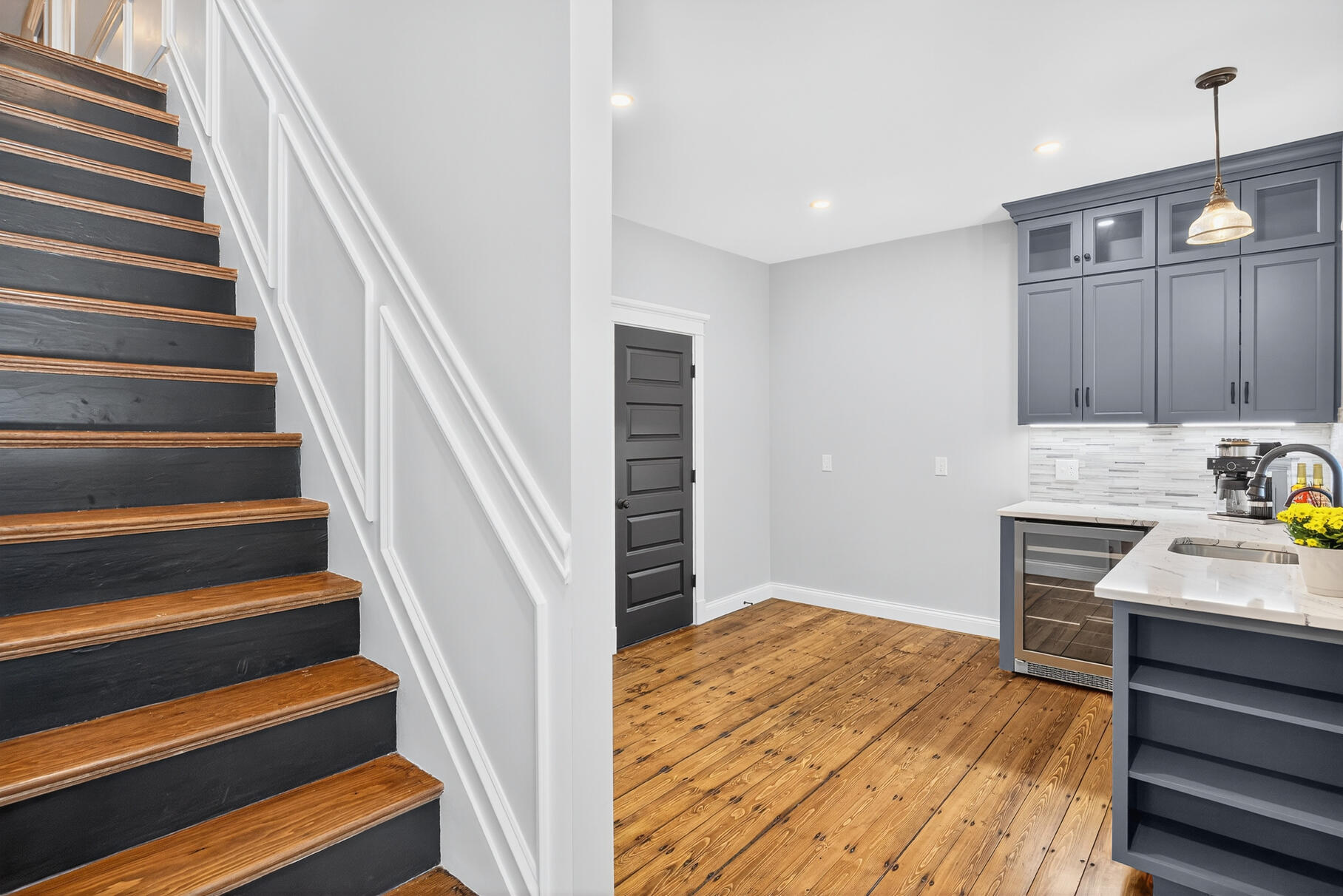 48 Red Brook Harbor Road Pocasset, MA 02559 - Photo 18 of 59 a view of a hallway with wooden floor and staircase