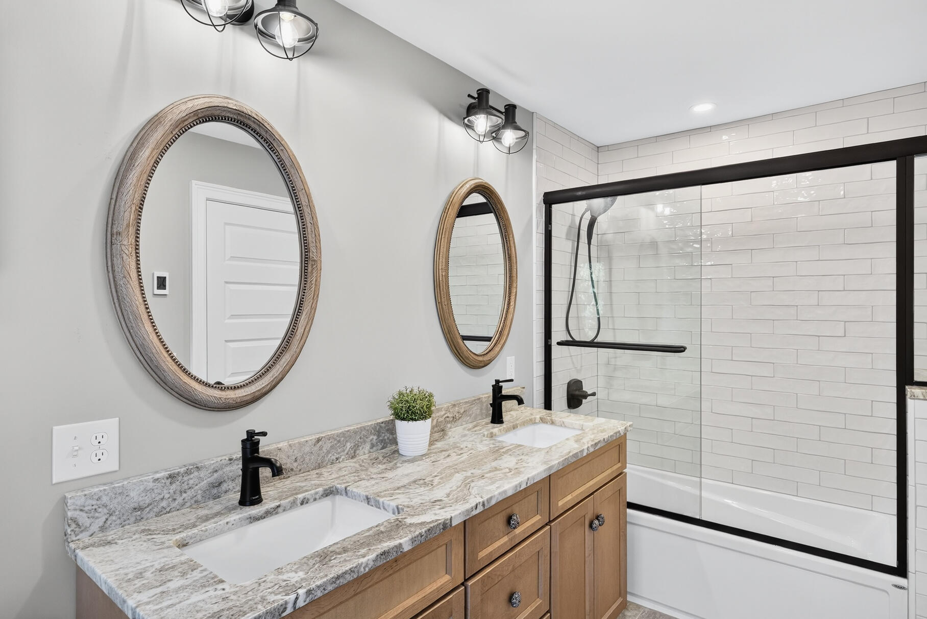 48 Red Brook Harbor Road Pocasset, MA 02559 - Photo 25 of 59 a bathroom with a granite countertop sink and a mirror