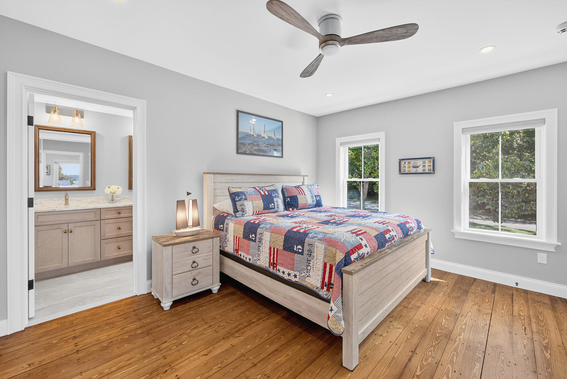 48 Red Brook Harbor Road Pocasset, MA 02559 - Photo 26 of 59 a bedroom with a large bed and a window