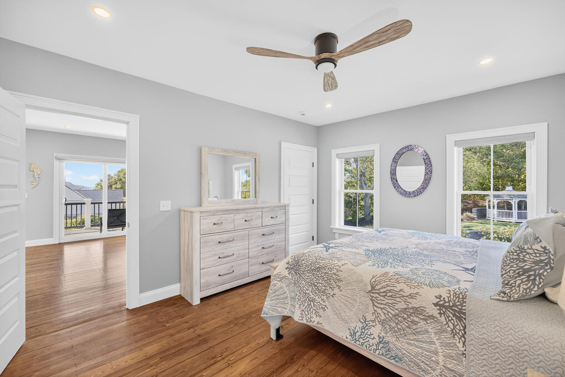 48 Red Brook Harbor Road Pocasset, MA 02559 - Photo 32 of 59 a spacious bedroom with a large bed and a window
