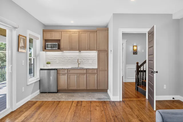 a view of a backyard with sitting area and furniture
