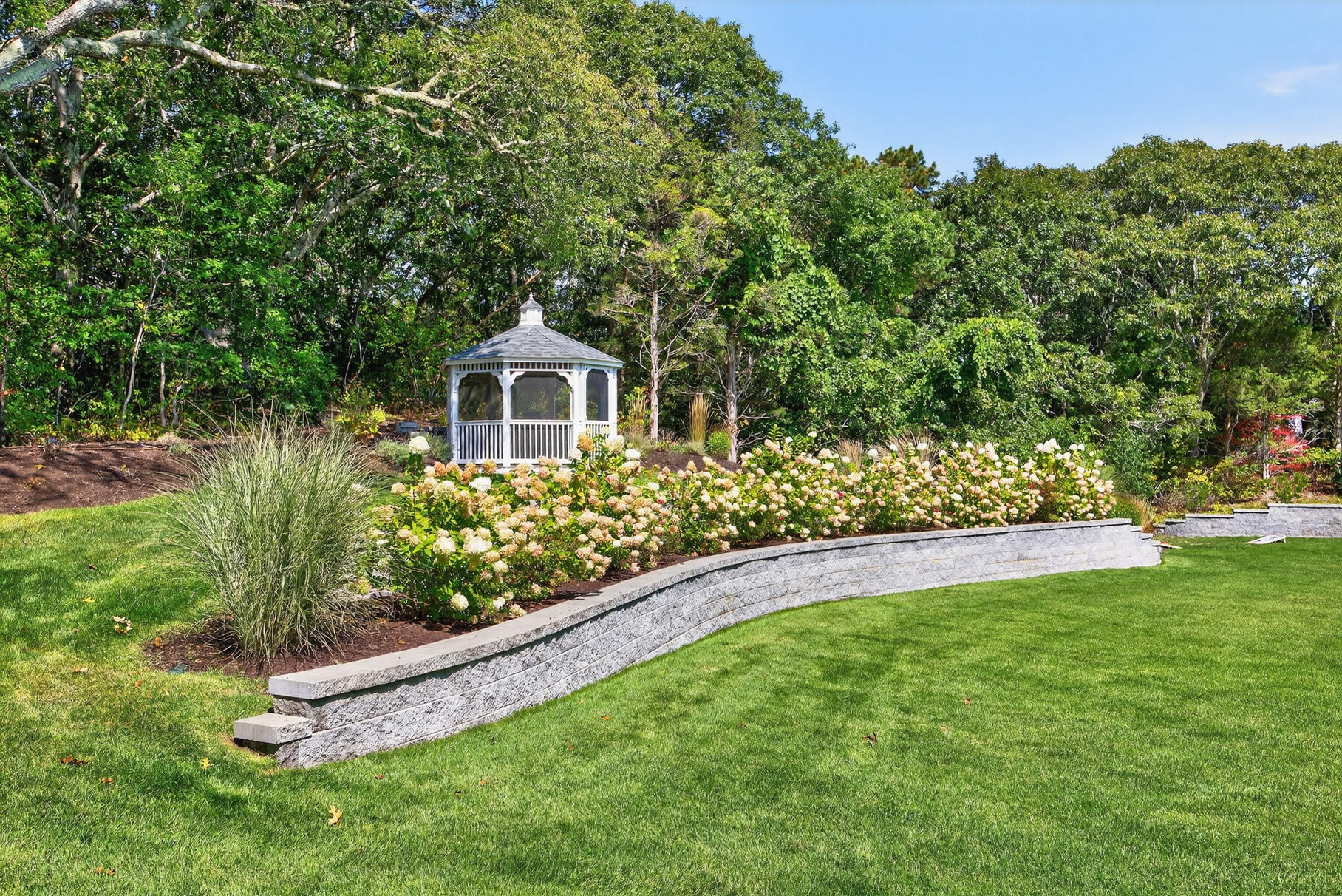 48 Red Brook Harbor Road Pocasset, MA 02559 - Photo 41 of 59 a front view of a house with a yard