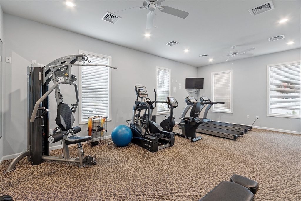 200 Martins Landing, Unit 102 North Reading, MA 01864 - Photo 32 of 33 a view of a room with gym equipment