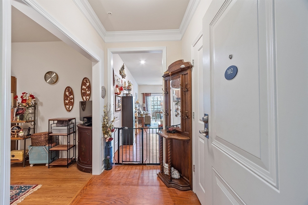 200 Martins Landing, Unit 102 North Reading, MA 01864 - Photo 4 of 33 a view of a gallery with window and closet