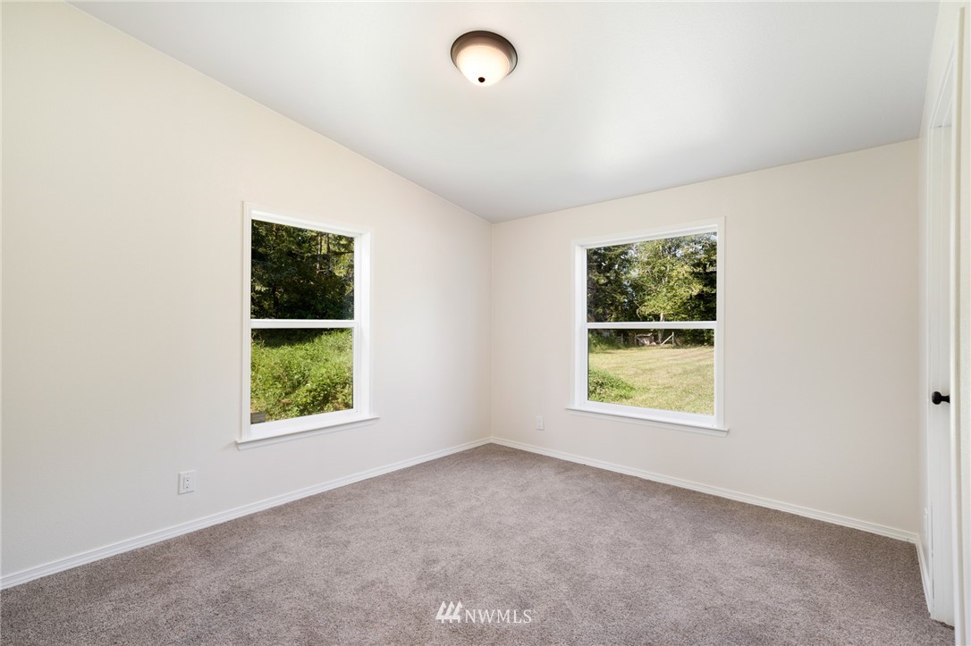 29122 Cedar Ponds Road Monroe, WA 98272 - Photo 17 of 25 an empty room with windows