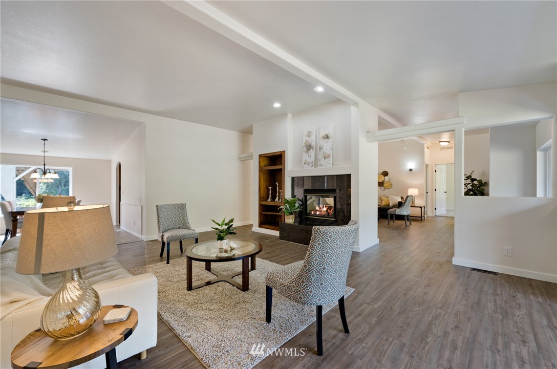29122 Cedar Ponds Road Monroe, WA 98272 - Photo 5 of 25 a living room with furniture and a fireplace