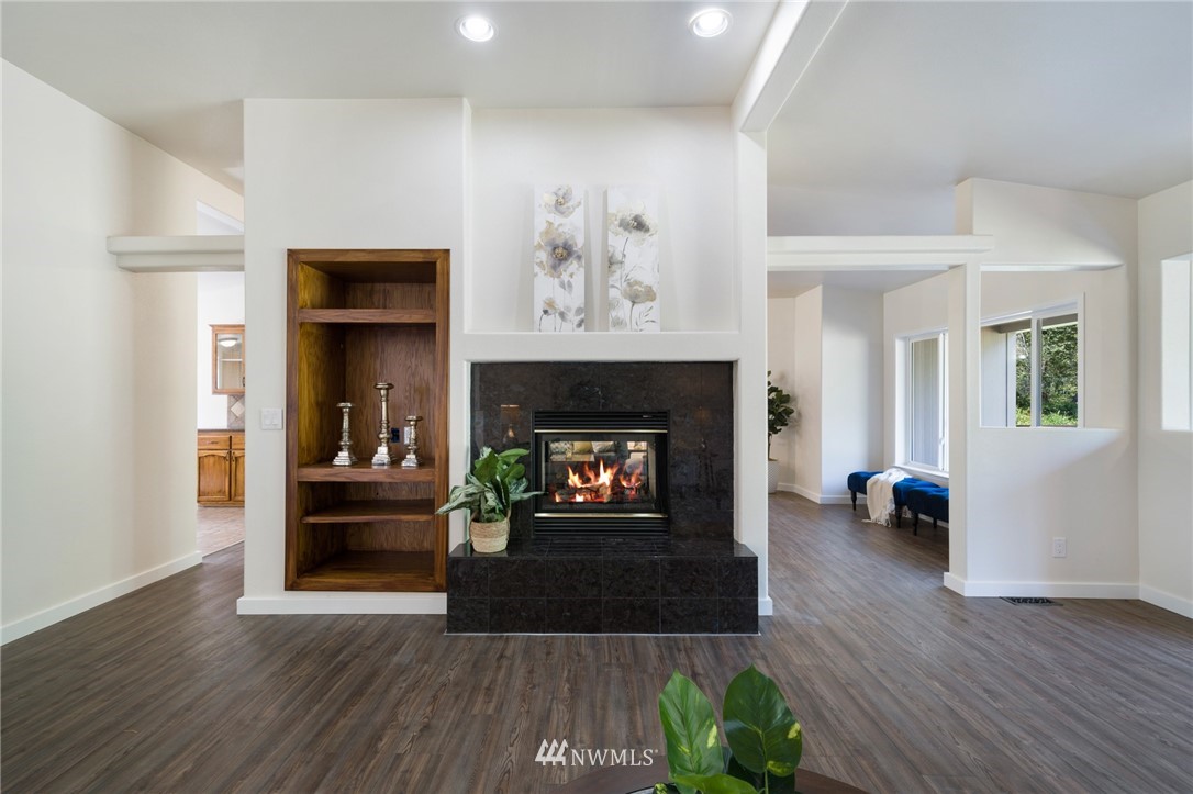 29122 Cedar Ponds Road Monroe, WA 98272 - Photo 8 of 25 a living room with furniture and a fireplace