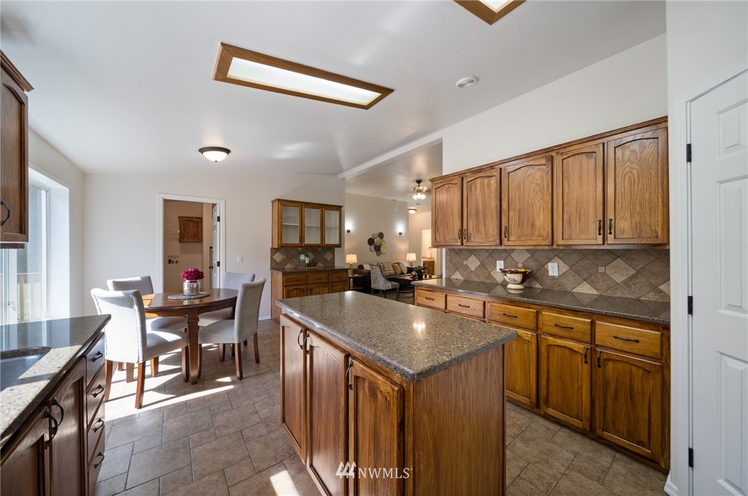 29122 Cedar Ponds Road Monroe, WA 98272 - Photo 10 of 25 a kitchen with a sink and cabinets