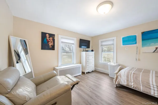 a bed room with a bed and a couch