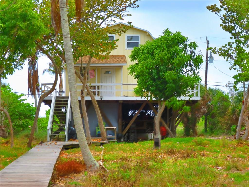 9866 Little Gasparilla Boca Grande, FL 33921 - Photo 1 of 1 Bayside Elevation.