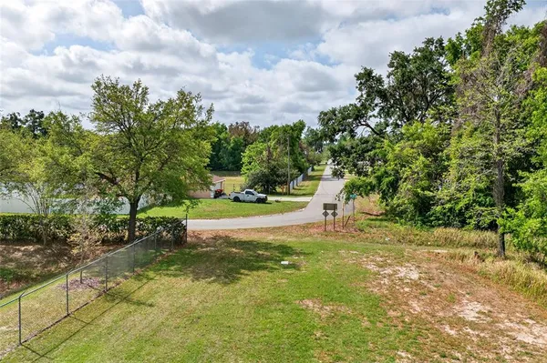 a view of a garden with a bench