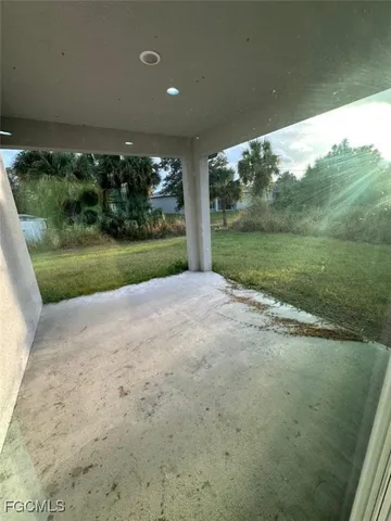 a view of a garden with an outdoor space