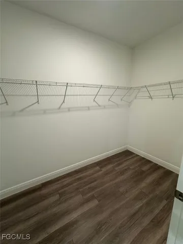 a view of a room with racks on the wall