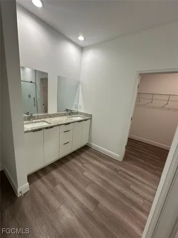 a view of a sink and dishwasher in a room