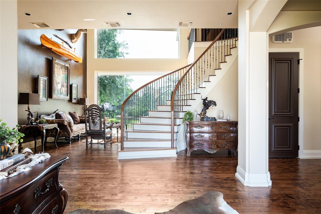 2312 Cactus Rio Lane Weatherford, TX 76087 - Photo 5 of 37 a view of entryway and hall with wooden floor