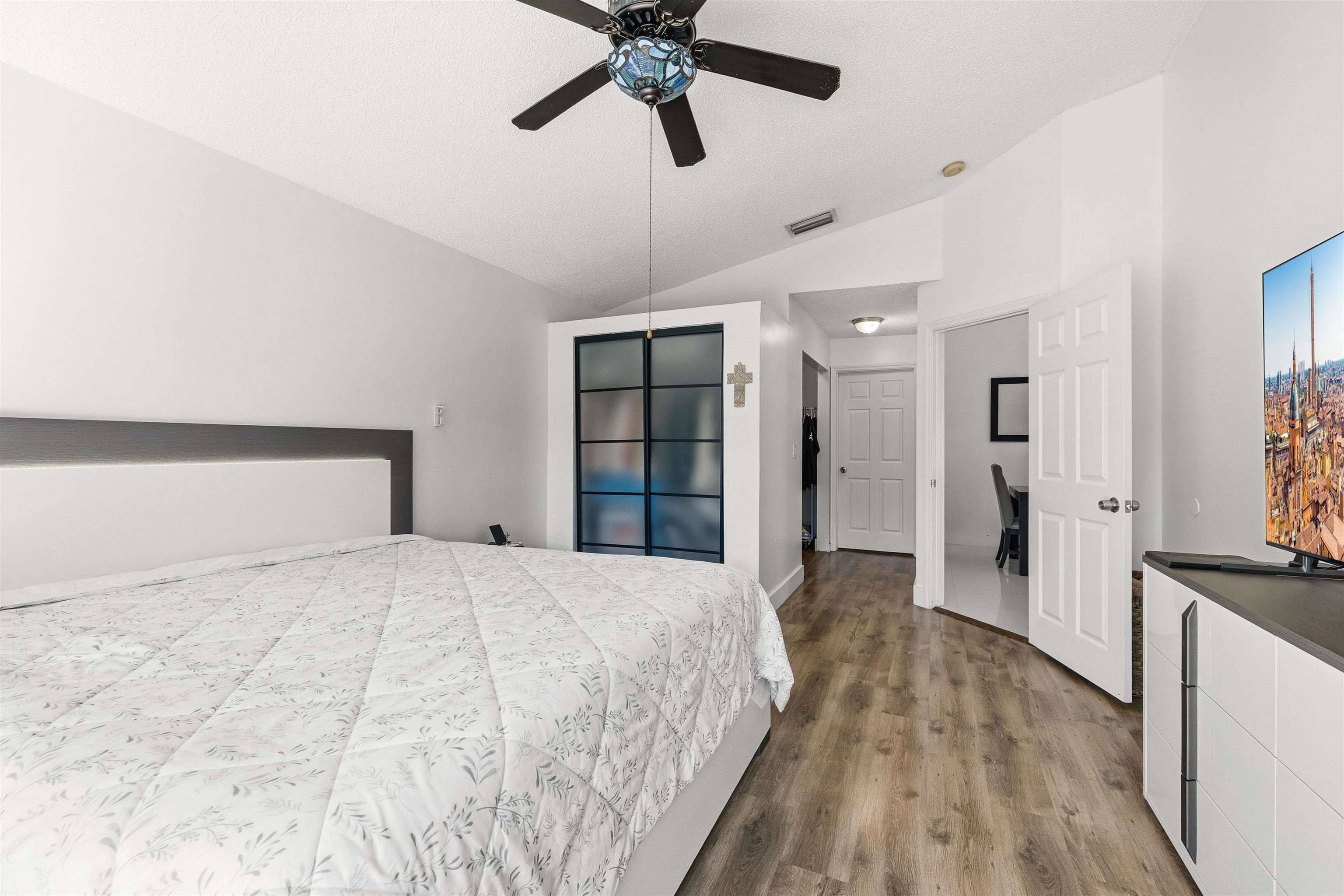 75 Gables Boulevard Weston, FL 33326 - Photo 13 of 29 Bedroom featuring lofted ceiling, wood finished floors, and ceiling fan