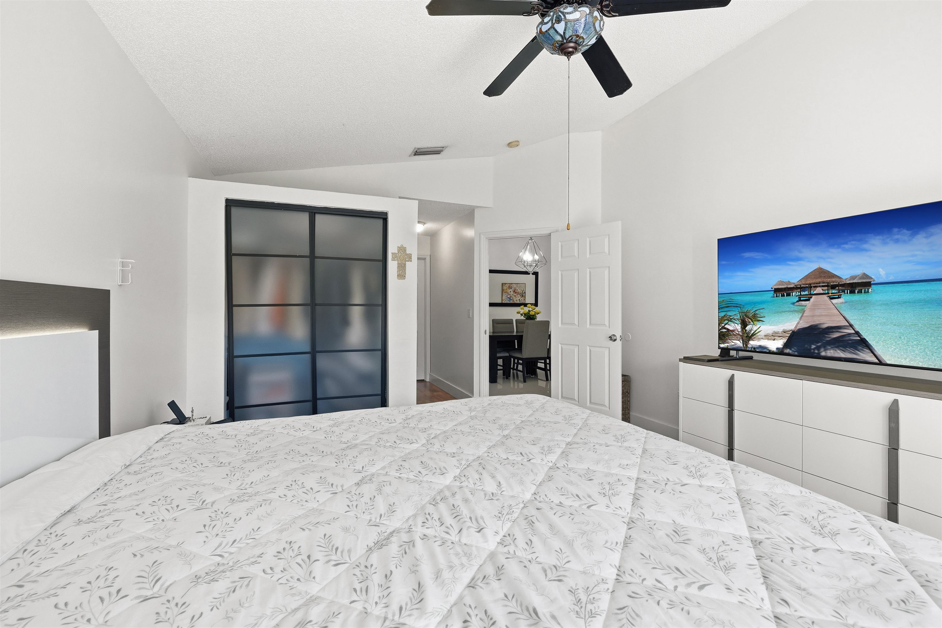 75 Gables Boulevard Weston, FL 33326 - Photo 14 of 29 Bedroom with vaulted ceiling, ceiling fan, and a closet