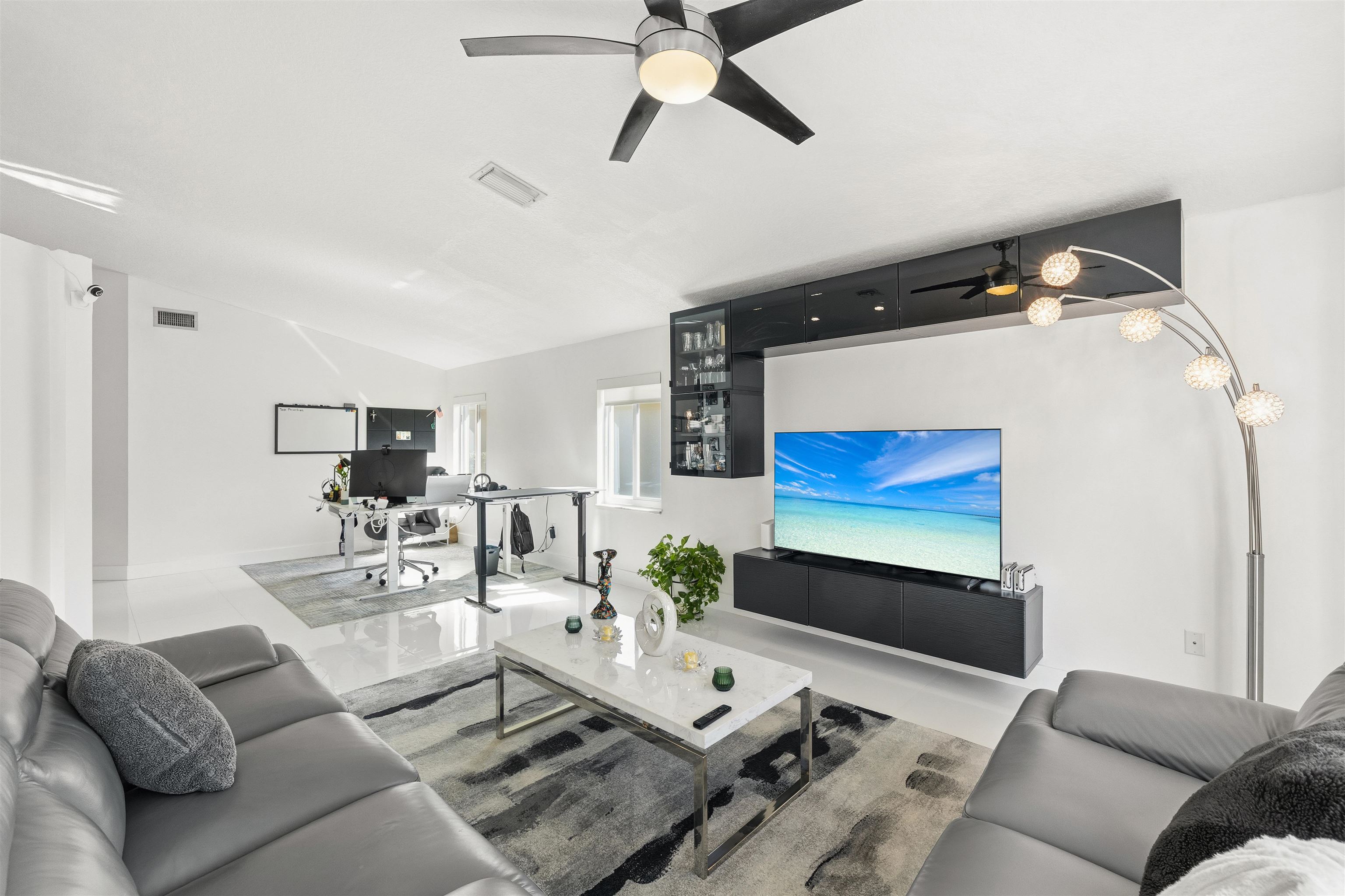 75 Gables Boulevard Weston, FL 33326 - Photo 4 of 29 Living room with an office area, a ceiling fan, and lofted ceiling