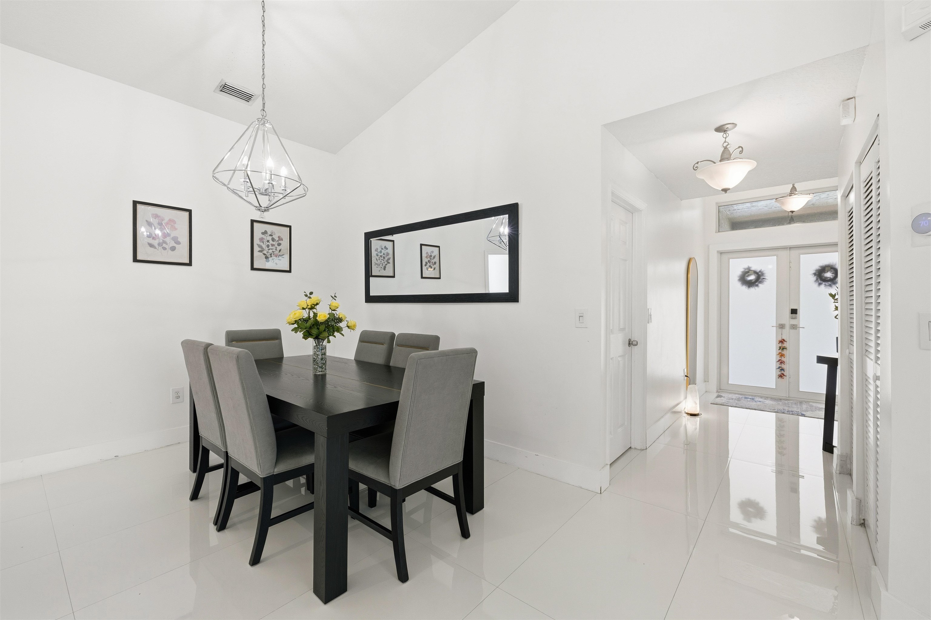 75 Gables Boulevard Weston, FL 33326 - Photo 6 of 29 Dining area featuring light tile patterned floors and french doors