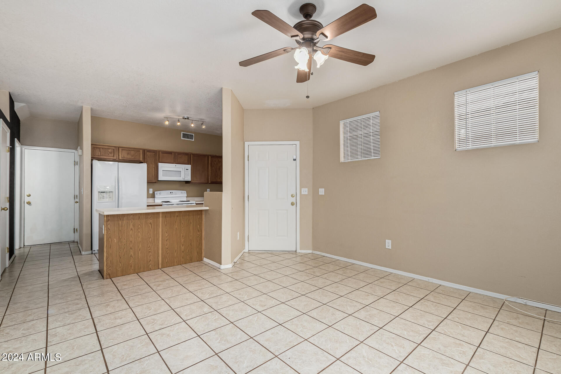 1371 South Boulder Street, Unit A Gilbert, AZ 85296 - Photo 10 of 43 a view of a kitchen with kitchen